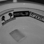 Junk sticker in the toilet.